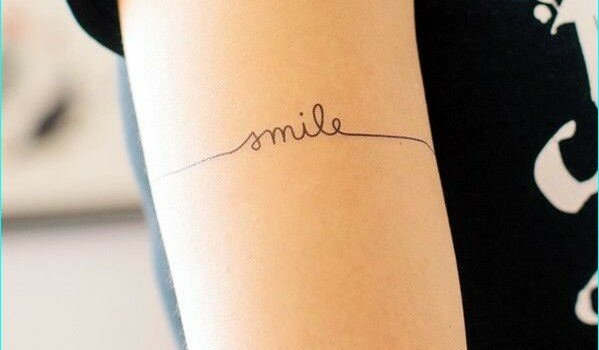 25 Stimulating Written Tattoos For Women